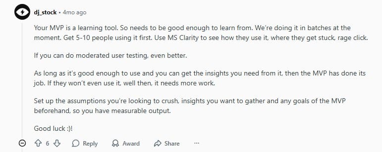 Screenshot of a Reddit comment explaining how to test an MVP using user feedback, MS Clarity, and measurable assumptions